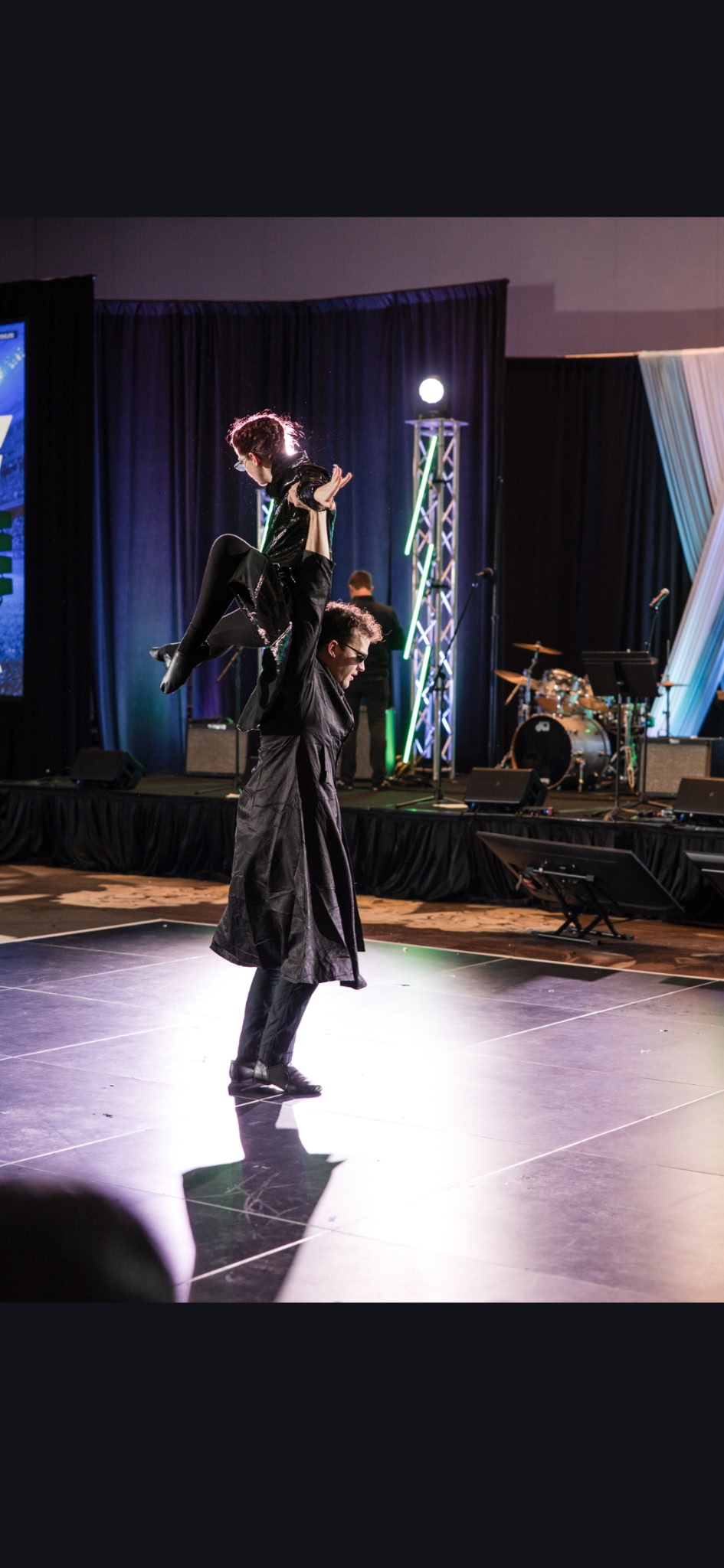 Sarah and John performing a partner lift